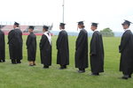 Soon to be HHS Grads line up to recieve their diplomas.